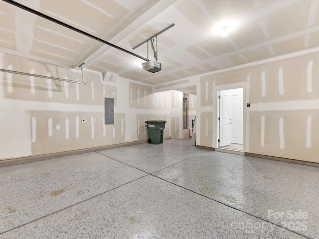 1516 Respect St NW, Concord, NC 28027 - garage featuring electric panel and a garage door opener