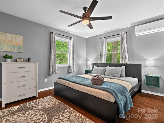 220 Deer Run Rd, Canton, NC 28716 - bedroom featuring a wall mounted AC, wood finished floors, and a ceiling fan