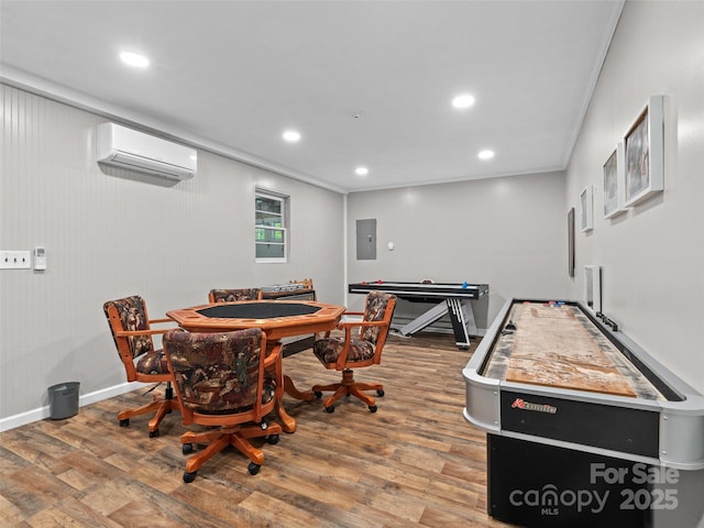 220 Deer Run Rd, Canton, NC 28716 - game room featuring an AC wall unit, electric panel, wood finished floors, ornamental molding, and recessed lighting