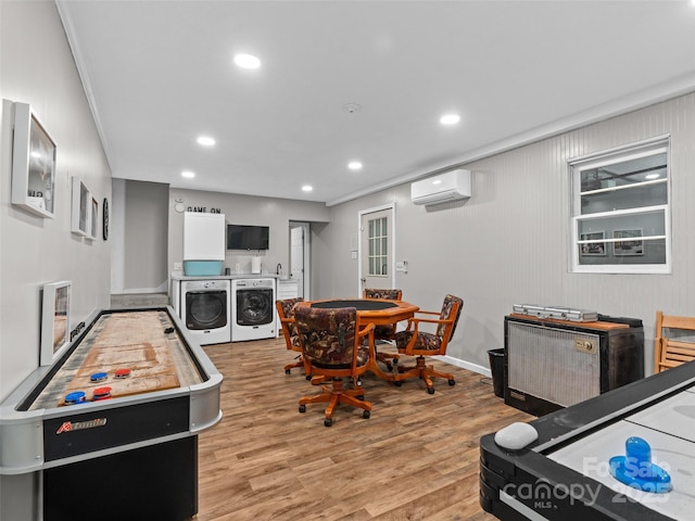 220 Deer Run Rd, Canton, NC 28716 - recreation room featuring independent washer and dryer, a wall mounted AC, light wood-style flooring, recessed lighting, and ornamental molding