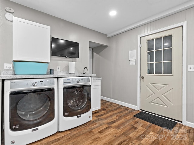 220 Deer Run Rd, Canton, NC 28716 - washroom featuring separate washer and dryer, cabinet space, and wood finished floors