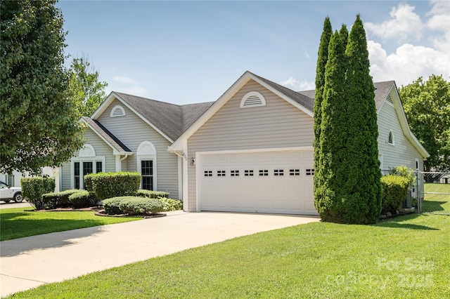 802 Woodlark Ct, Fletcher, NC 28732 - view of front of house featuring a garage, driveway, and roof with shingles