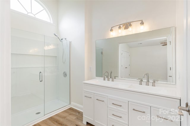 802 Woodlark Ct, Fletcher, NC 28732 - bathroom with double vanity, wood finished floors, and a shower with shower door
