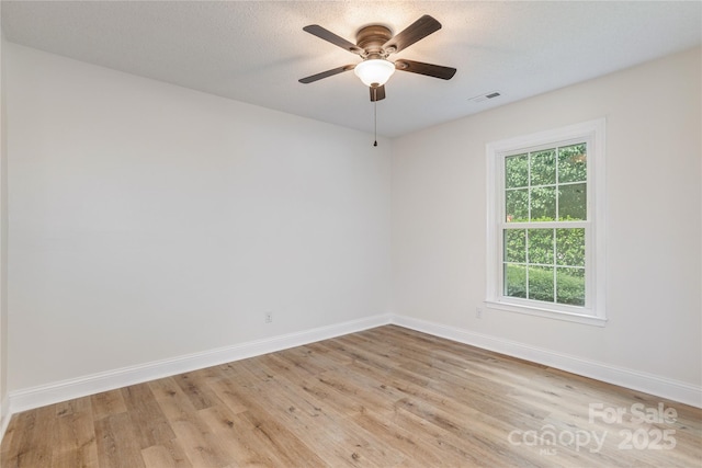 802 Woodlark Ct, Fletcher, NC 28732 - unfurnished room featuring light wood finished floors and ceiling fan