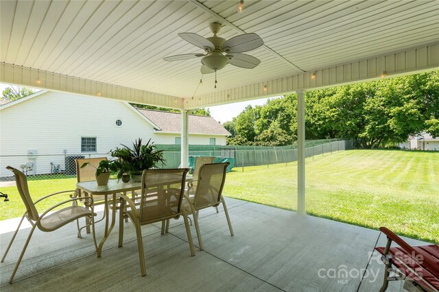 802 Woodlark Ct, Fletcher, NC 28732 - deck with ceiling fan, a patio area, a fenced backyard, and outdoor dining area