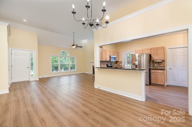975 Pine Knoll Rd, Fort Mill, SC 29715 - kitchen featuring stainless steel appliances, backsplash, a chandelier, light wood-style floors, and vaulted ceiling