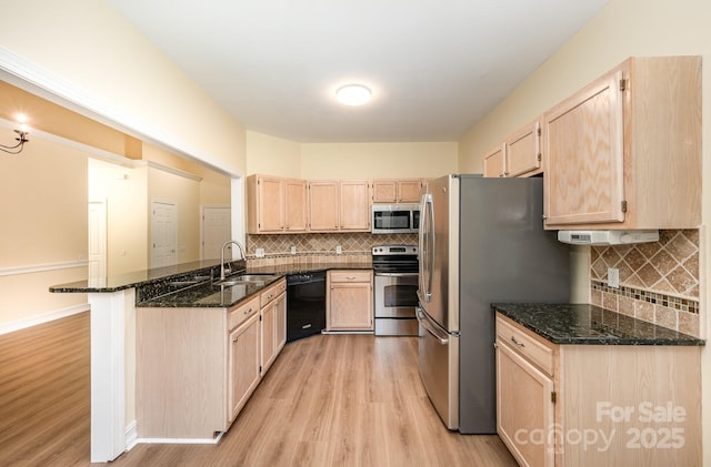 975 Pine Knoll Rd, Fort Mill, SC 29715 - kitchen featuring light brown cabinets, stainless steel appliances, a peninsula, and light wood-style floors