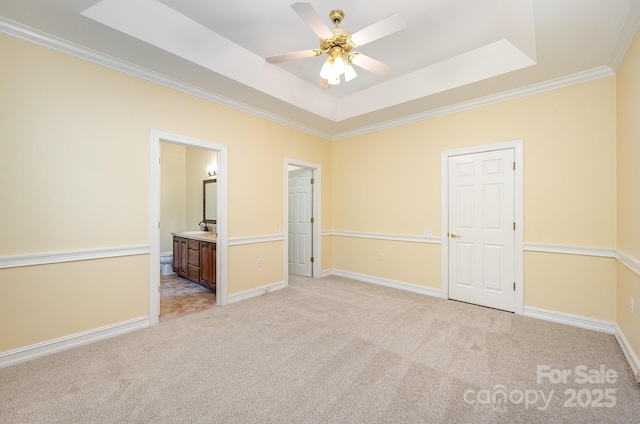 975 Pine Knoll Rd, Fort Mill, SC 29715 - unfurnished bedroom with a raised ceiling, light colored carpet, ornamental molding, and ensuite bathroom