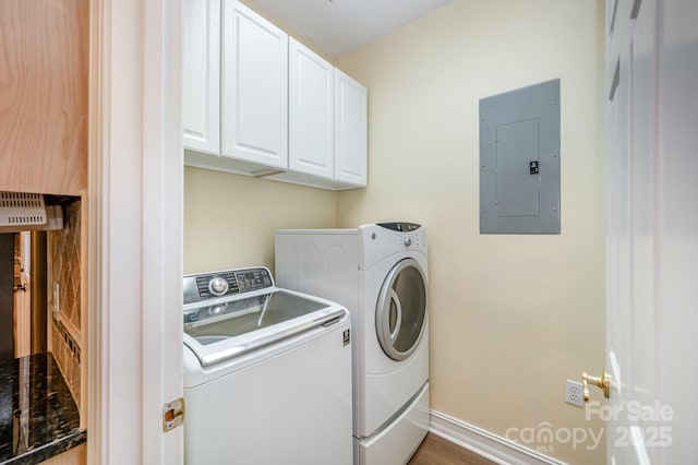 975 Pine Knoll Rd, Fort Mill, SC 29715 - laundry room with electric panel, washing machine and dryer, and cabinet space