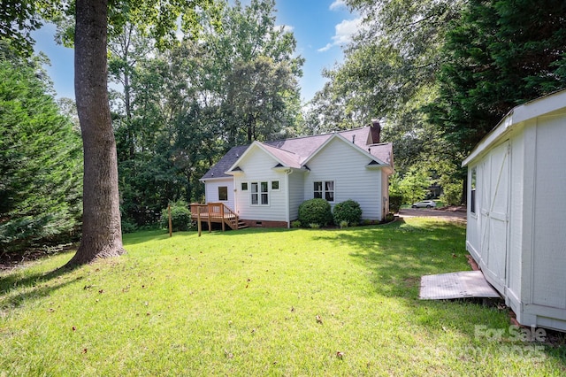 975 Pine Knoll Rd, Fort Mill, SC 29715 - rear view of property featuring crawl space, a wooden deck, a yard, and a shingled roof