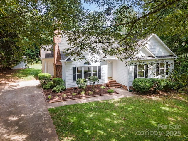 975 Pine Knoll Rd, Fort Mill, SC 29715 - view of front of house featuring a front lawn, driveway, and a chimney