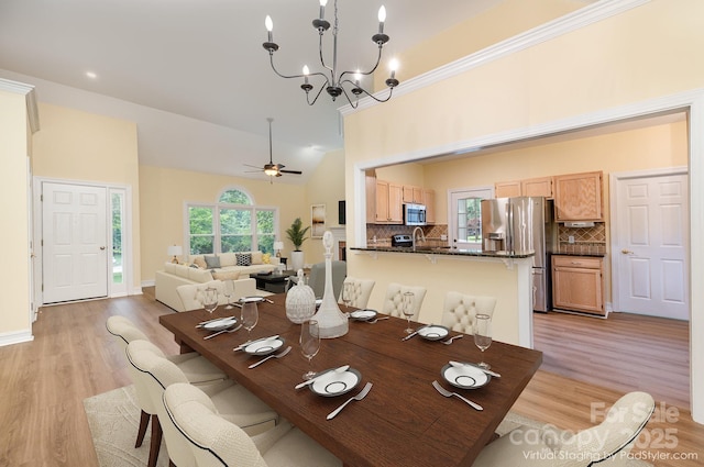 975 Pine Knoll Rd, Fort Mill, SC 29715 - dining room with a chandelier, light wood-style flooring, ceiling fan, and vaulted ceiling