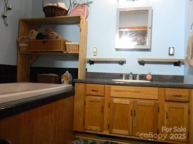 1425 Sorrells Cove Rd, Clyde, NC 28721 - kitchen with brown cabinets and dark countertops