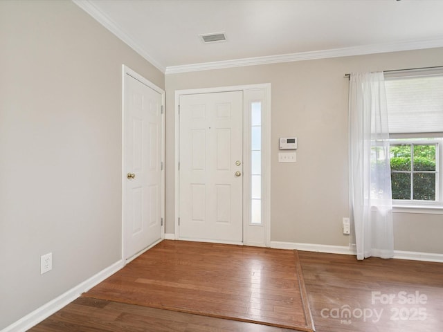 3830 Brookchase Ln, Charlotte, NC 28205 - foyer featuring wood finished floors and crown molding