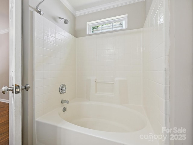 3830 Brookchase Ln, Charlotte, NC 28205 - bathroom with ornamental molding, tub / shower combination, and wood finished floors