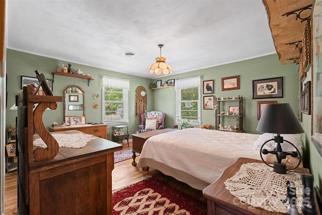 25 Wall Rd, Tryon, NC 28782 - bedroom with light wood-style flooring and crown molding