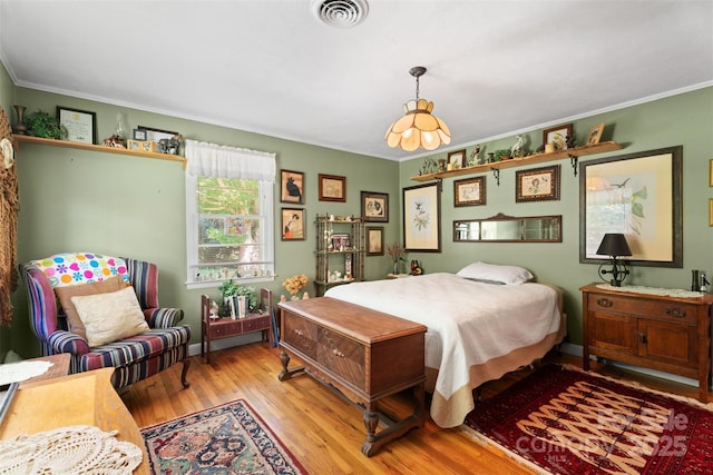 25 Wall Rd, Tryon, NC 28782 - bedroom with crown molding and light wood-style flooring