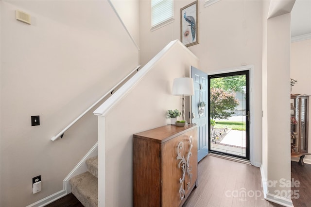 6422 Gatesville Ln, Charlotte, NC 28270 - entryway featuring wood finished floors, stairs, and a high ceiling