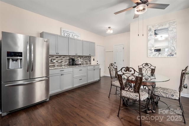 6422 Gatesville Ln, Charlotte, NC 28270 - kitchen with stainless steel fridge, dark wood finished floors, ceiling fan, tasteful backsplash, and gray cabinetry