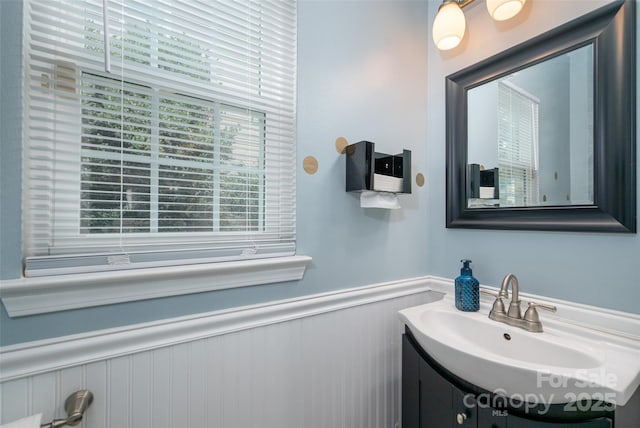 6422 Gatesville Ln, Charlotte, NC 28270 - bathroom featuring wainscoting and vanity
