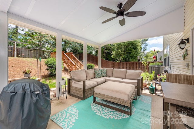 6422 Gatesville Ln, Charlotte, NC 28270 - fenced backyard with an outdoor living space, a ceiling fan, area for grilling, and a patio