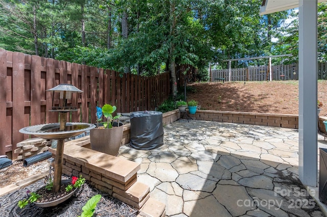 6422 Gatesville Ln, Charlotte, NC 28270 - fenced backyard with a patio area