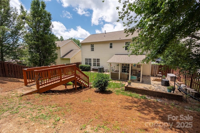 6422 Gatesville Ln, Charlotte, NC 28270 - rear view of property with a fenced backyard, a patio area, and a wooden deck