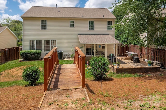 6422 Gatesville Ln, Charlotte, NC 28270 - rear view of house with a fenced backyard, a patio, and a deck