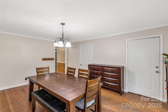 6115 Campbell Rd, York, SC 29745 - dining room with hardwood / wood-style floors, a chandelier, and crown molding