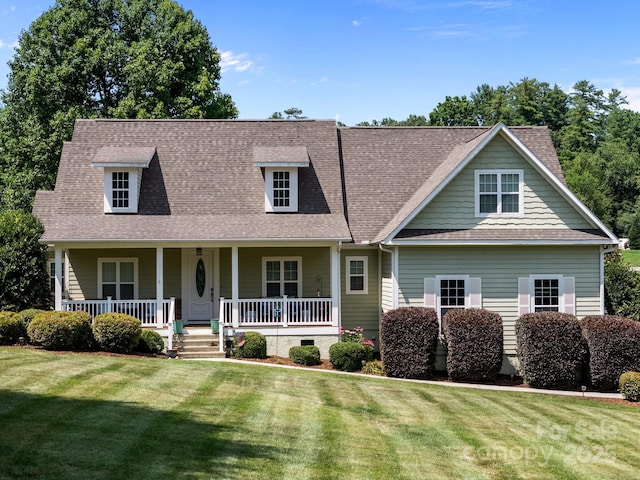 1006 Pin Oak Trl Unit 5, Hendersonville, NC 28739 - view of front of home with a front lawn, a shingled roof, and a porch