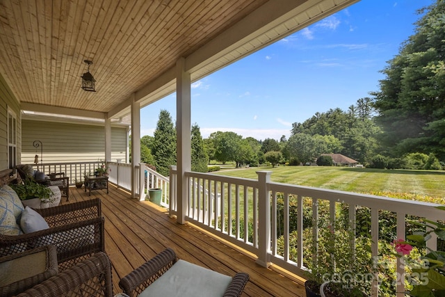 1006 Pin Oak Trl Unit 5, Hendersonville, NC 28739 - wooden porch with view of scattered trees and a lawn
