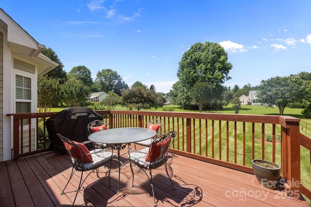 1006 Pin Oak Trl Unit 5, Hendersonville, NC 28739 - wooden deck featuring outdoor dining space, a yard, and grilling area