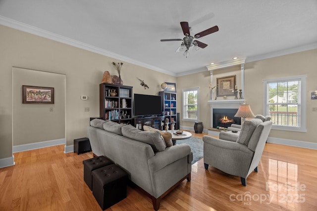 1006 Pin Oak Trl Unit 5, Hendersonville, NC 28739 - living room with plenty of natural light, a fireplace, crown molding, light wood-style floors, and ceiling fan