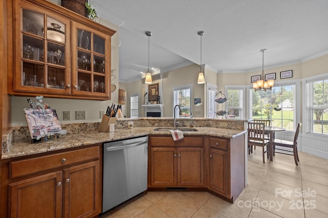 1006 Pin Oak Trl Unit 5, Hendersonville, NC 28739 - kitchen with stainless steel dishwasher, a peninsula, brown cabinets, a chandelier, and pendant lighting