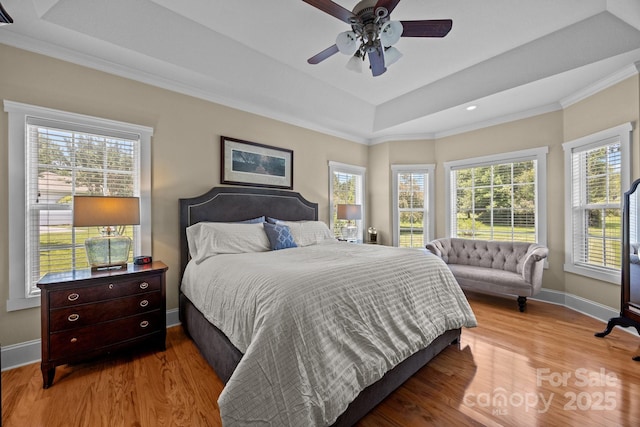 1006 Pin Oak Trl Unit 5, Hendersonville, NC 28739 - bedroom featuring wood finished floors, crown molding, a raised ceiling, a ceiling fan, and recessed lighting