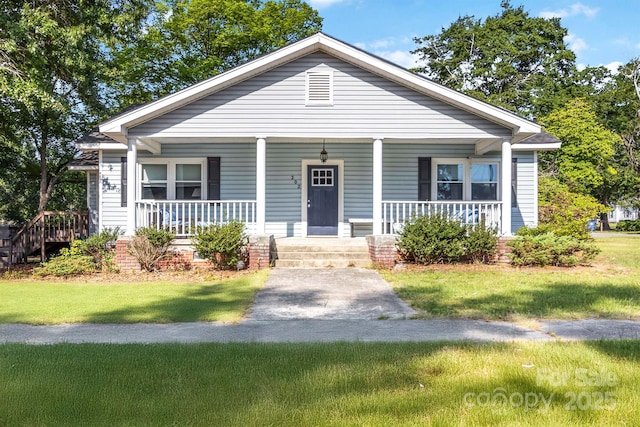 202 Gum St, Pageland, SC 29728 - bungalow featuring a front lawn and a porch