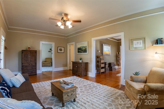 102 Cuthberson St, Morganton, NC 28655 - living room with wood finished floors, ceiling fan, and crown molding