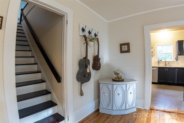 102 Cuthberson St, Morganton, NC 28655 - stairway featuring ornamental molding and wood finished floors