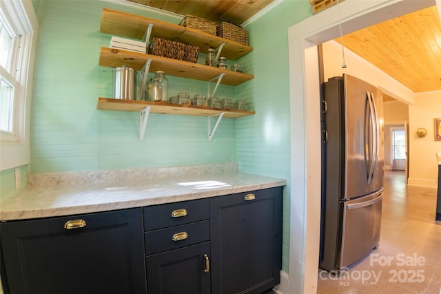 102 Cuthberson St, Morganton, NC 28655 - kitchen with freestanding refrigerator, wooden ceiling, plenty of natural light, open shelves, and light stone counters