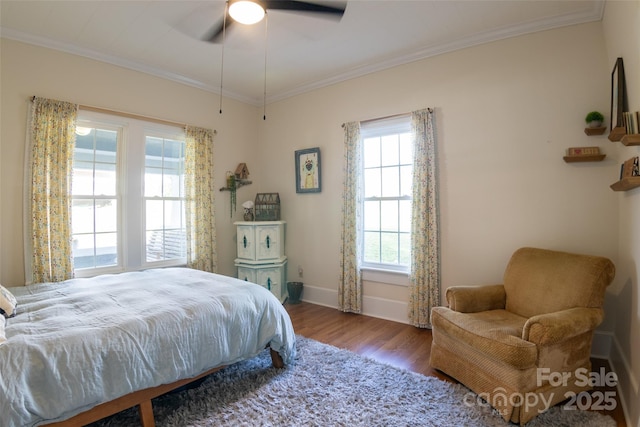 102 Cuthberson St, Morganton, NC 28655 - bedroom with multiple windows, wood finished floors, crown molding, and a ceiling fan