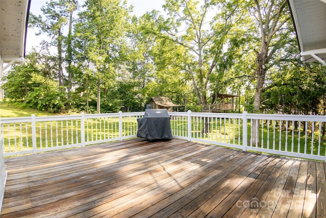102 Cuthberson St, Morganton, NC 28655 - wooden deck with a lawn, view of scattered trees, and a grill