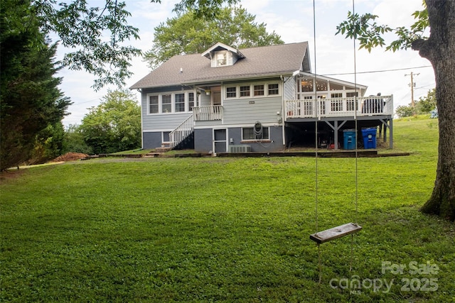 102 Cuthberson St, Morganton, NC 28655 - back of house featuring a yard, a sunroom, and stairway