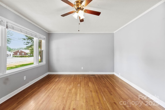 814 W Gold St, Kings Mountain, NC 28086 - unfurnished room with wood finished floors, ornamental molding, and ceiling fan