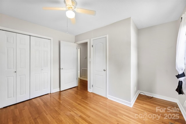 814 W Gold St, Kings Mountain, NC 28086 - unfurnished bedroom with light wood finished floors, a closet, and ceiling fan