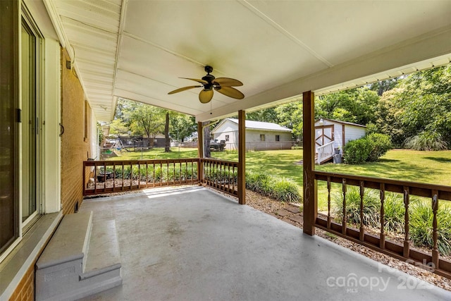 814 W Gold St, Kings Mountain, NC 28086 - view of patio with ceiling fan, a storage shed, and a residential view
