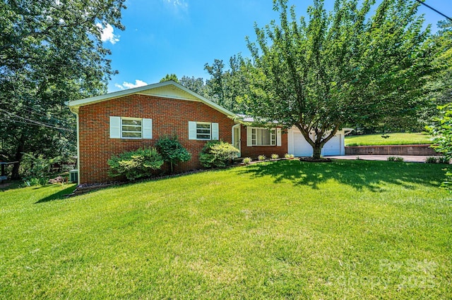 3954 E Burke Blvd, Connelly Springs, NC 28612 - ranch-style home featuring a front yard, brick siding, a garage, and concrete driveway