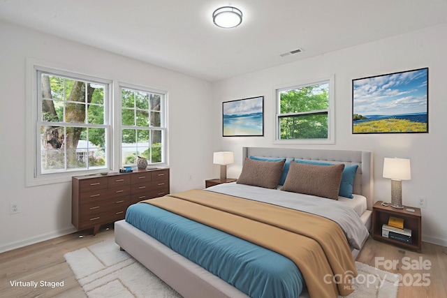 5420 Gwynne Ave, Charlotte, NC 28205 - bedroom featuring light wood-style floors and baseboards