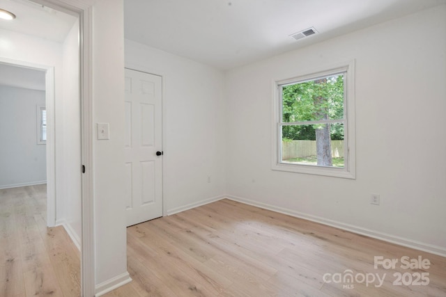 5420 Gwynne Ave, Charlotte, NC 28205 - empty room featuring light wood-style floors and baseboards