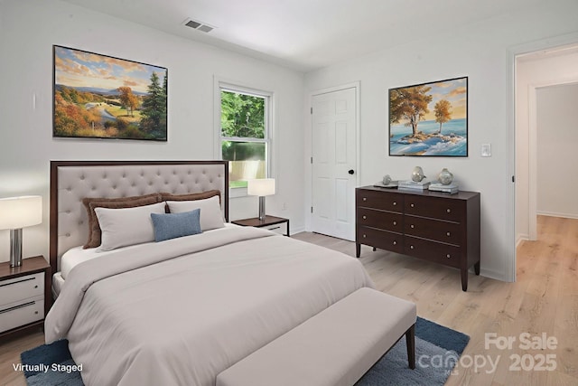 5420 Gwynne Ave, Charlotte, NC 28205 - bedroom featuring light wood-style floors and baseboards