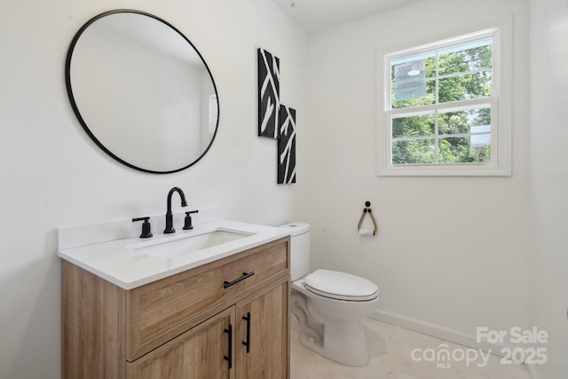 5420 Gwynne Ave, Charlotte, NC 28205 - half bath featuring vanity and tile patterned flooring